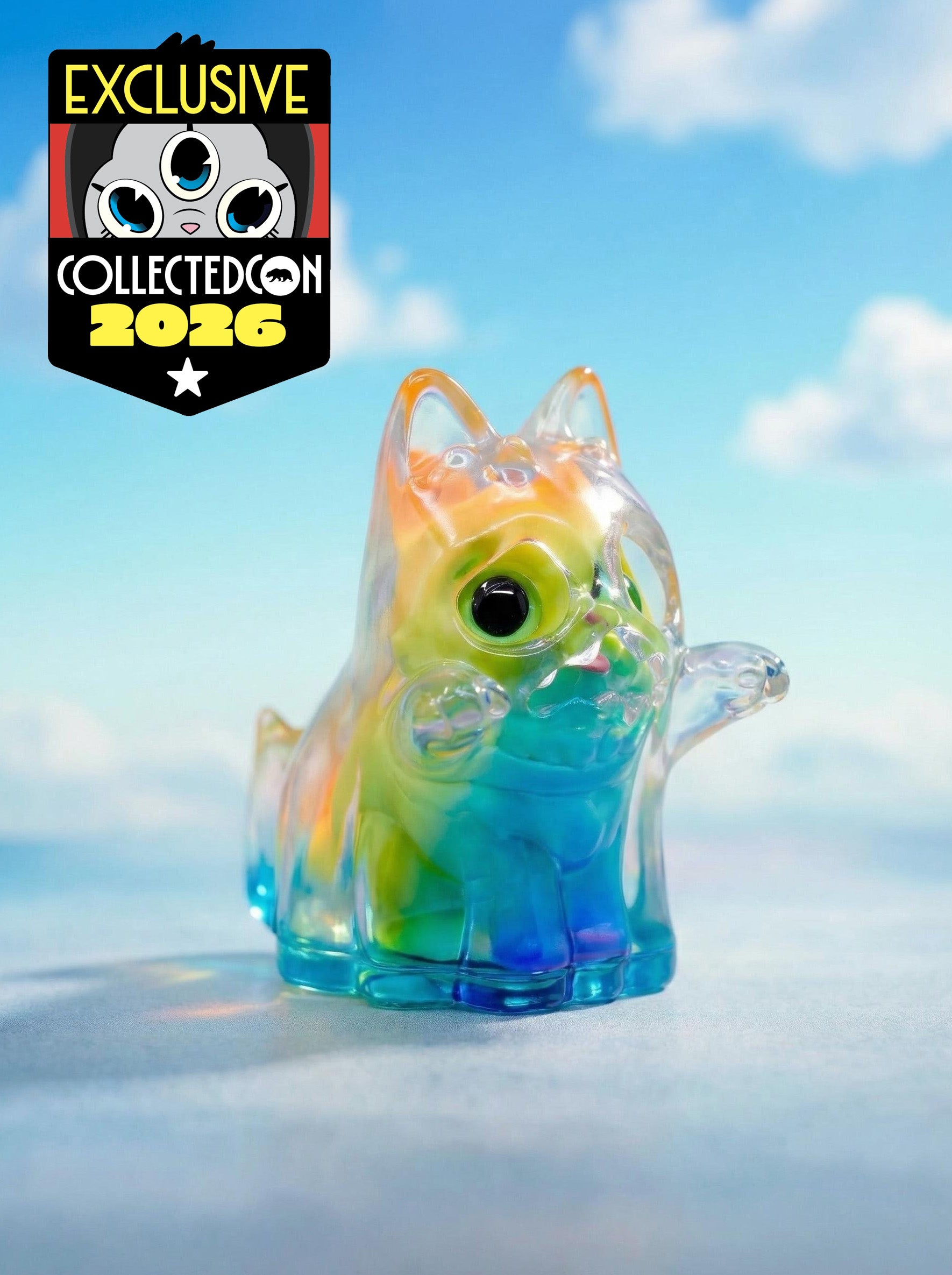 Rainbow Ghost Cat by HOTRU: a translucent vinyl figure with rainbow hues, oversized eyes, and upraised paws; exclusive from CollectedCon 2026.
