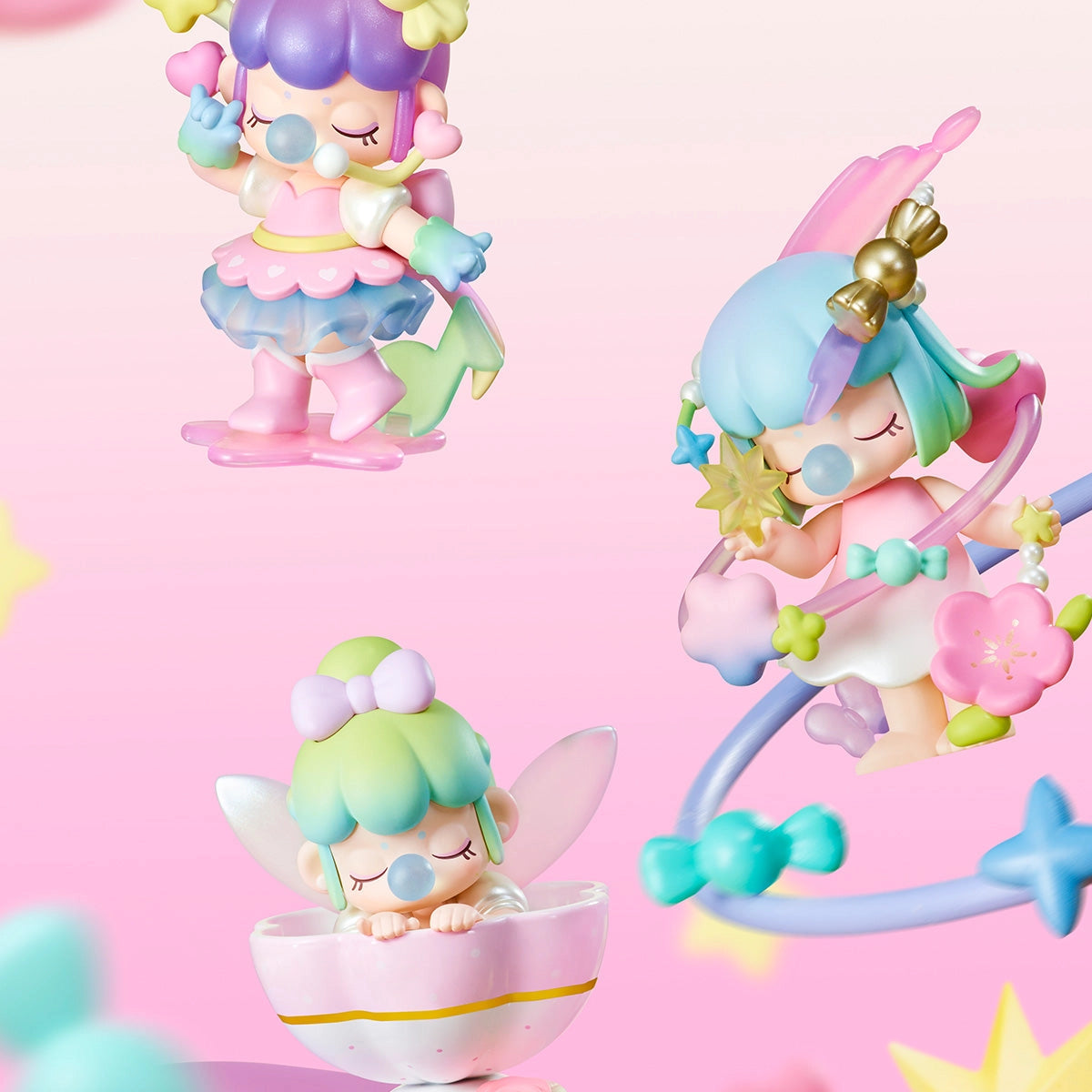 Three chibi figures from Nanci's Sweet Time Blind Box Series, featuring magical girls with pastel hair, displayed on star-themed bases and accessories.