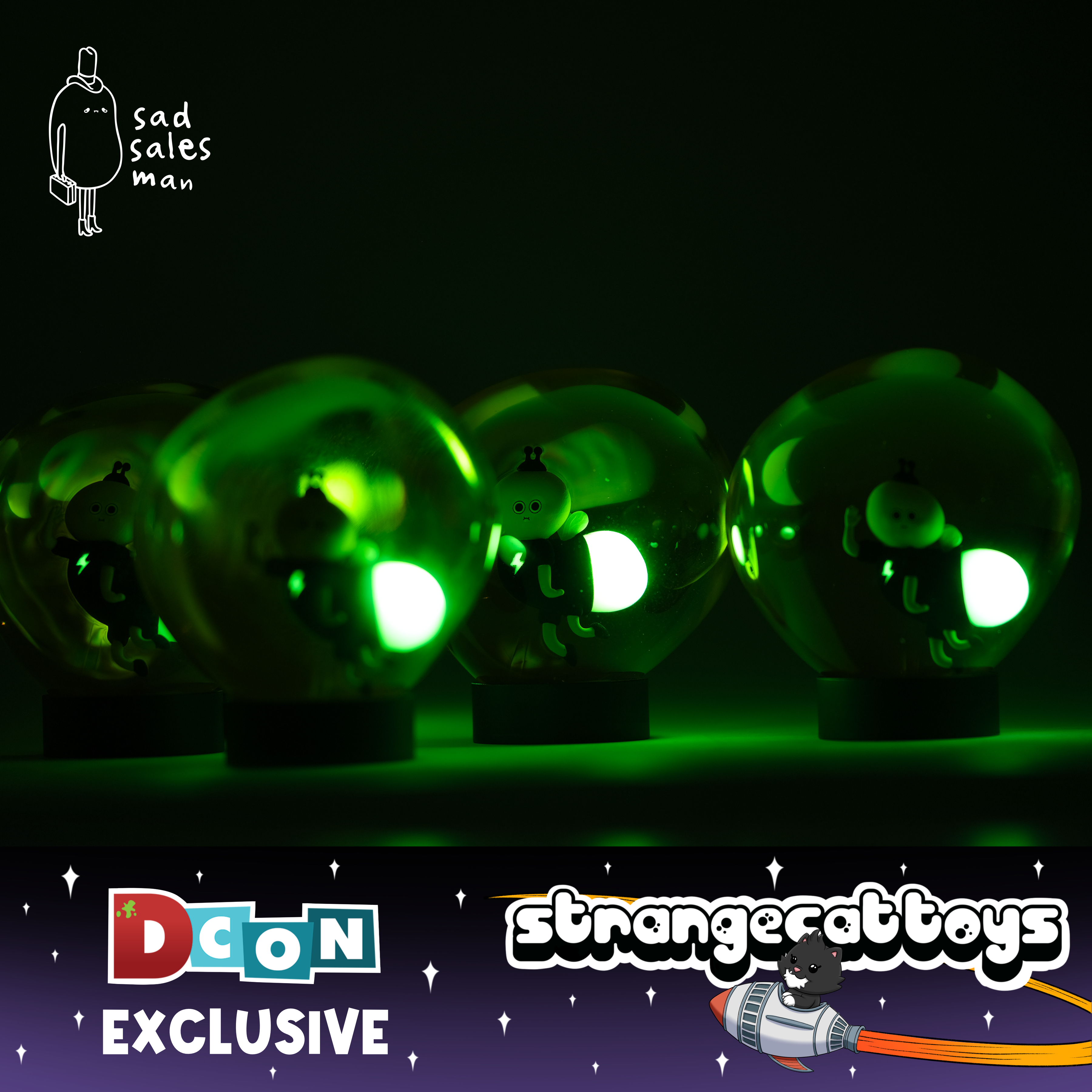 Lightning Bug by Sad Salesman: Four snow-globe domes with green LEDs illuminate figures, featuring a lightning-bolt motif. Includes DCon Exclusive and Strange Cat Toys branding.