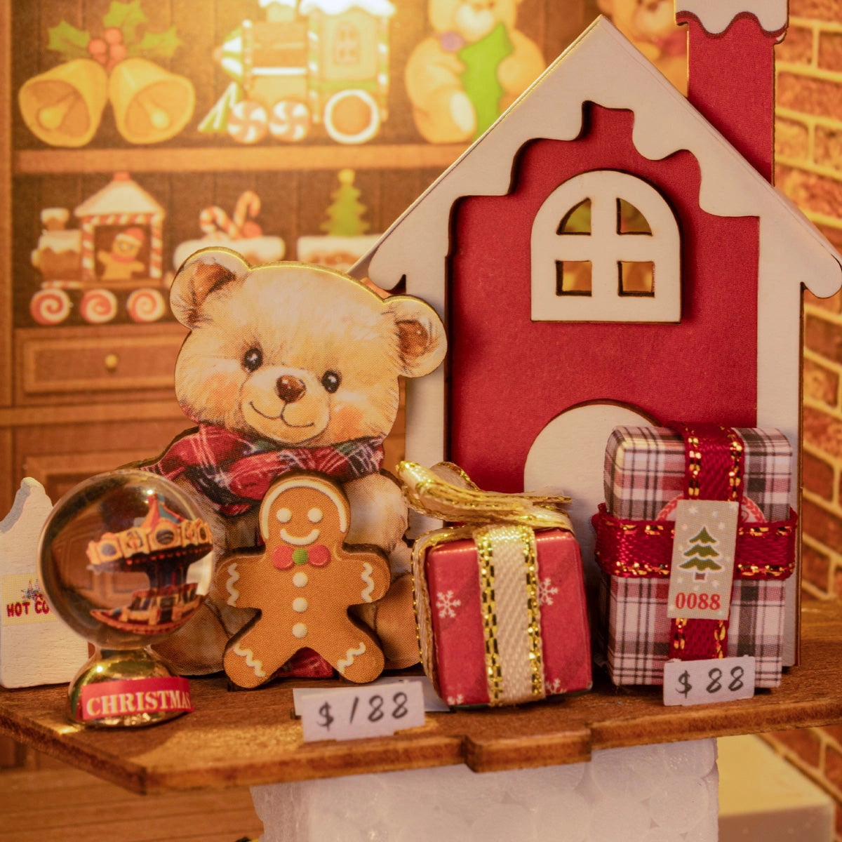 Rolife 3D Wooden Puzzle - Santa's Toy Shop DP006: Festive vignette featuring a teddy bear, gingerbread man, presents, snow globe, and house façade as part of a 3D puzzle kit.