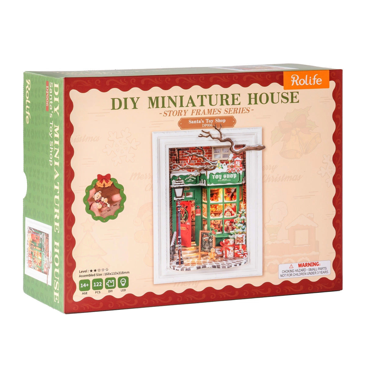 Rolife 3D Wooden Puzzle - Santa's Toy Shop DP006 box displaying a Christmas-themed shadow-box diorama kit with 122 pieces and LED lighting, part of the Story Frames Series.