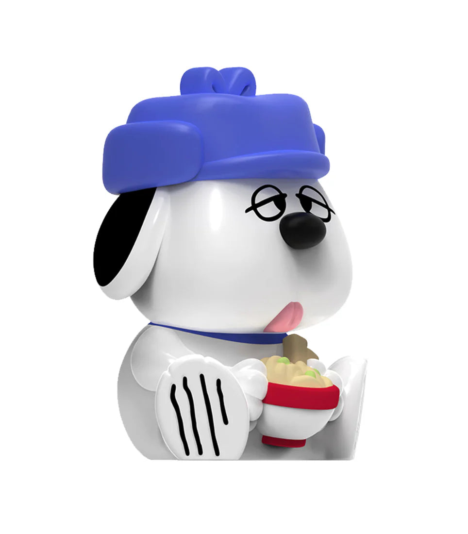 Rokimoto x PEANUTS Series 2 Blind Box features a cartoon-dog figurine with a blue hat, holding a noodle bowl, embodying playful collectible charm.