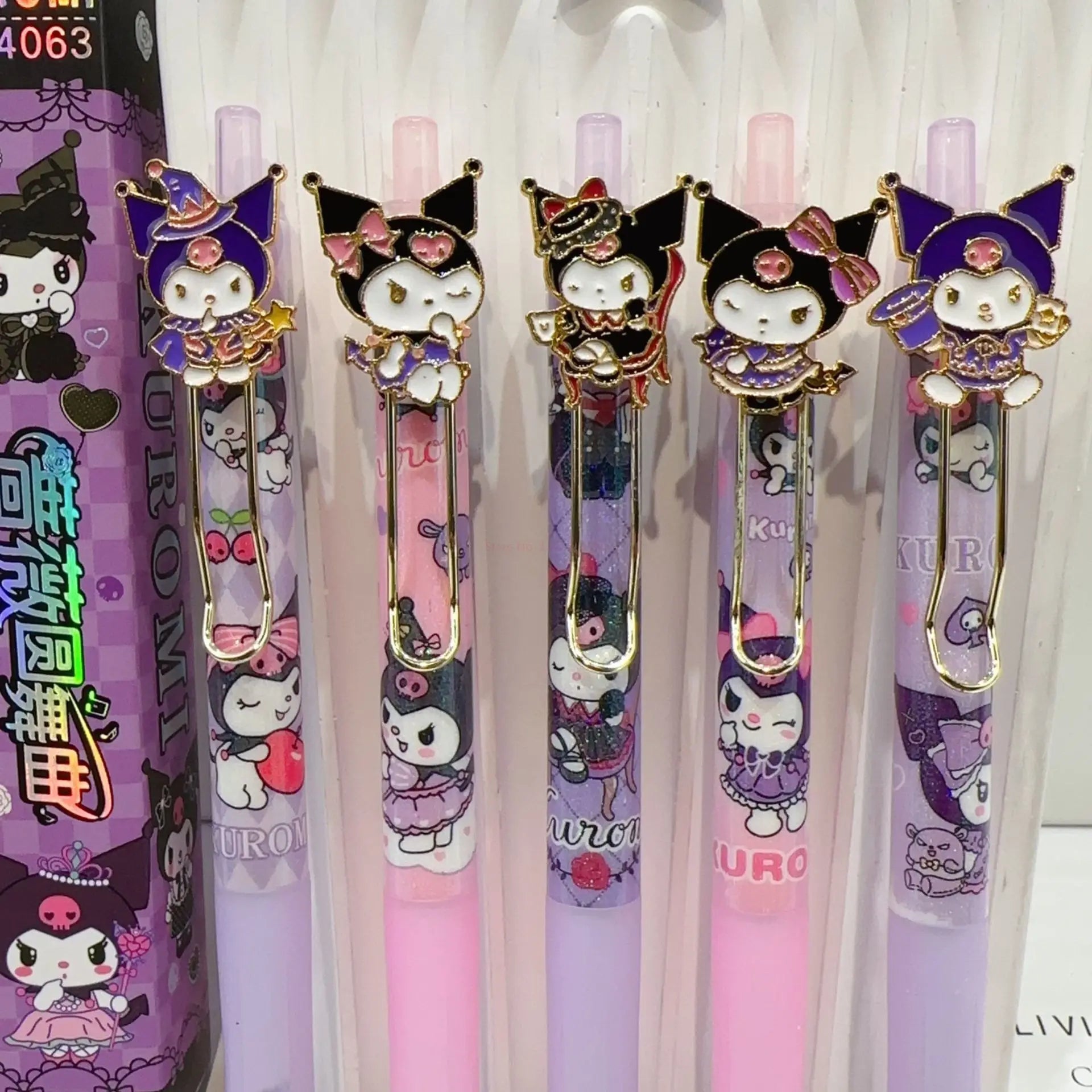 A group of Kuromi-themed gel pens in a blind box, featuring cartoon characters. From Strangecat Toys, a blind box and art toy store.