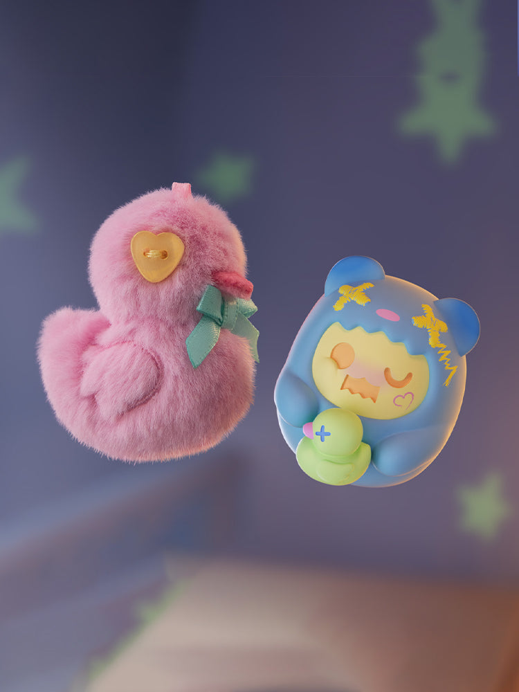 ShinWoo - Hug Me Mini Series Blind Box features plush-like characters, including a pink duck with a heart button eye and a blue creature holding an object.