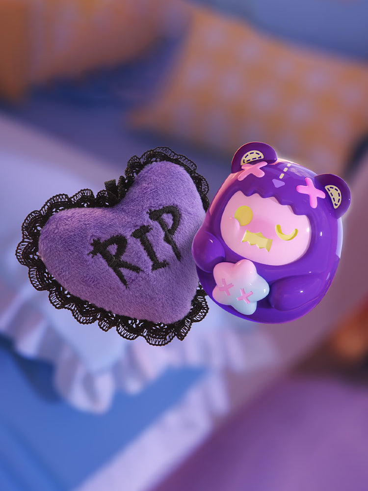 ShinWoo - Hug Me Mini Series Blind Box featuring a plush heart cushion and a glossy monster figurine, both showcasing unique, playful designs in a bedroom setting.