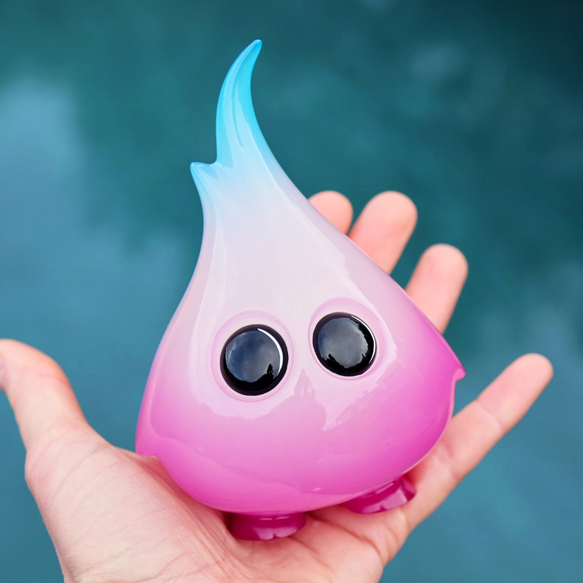 Moon Flare Spark-ling toy held in hand, limited edition resin figure, 5.25 tall.