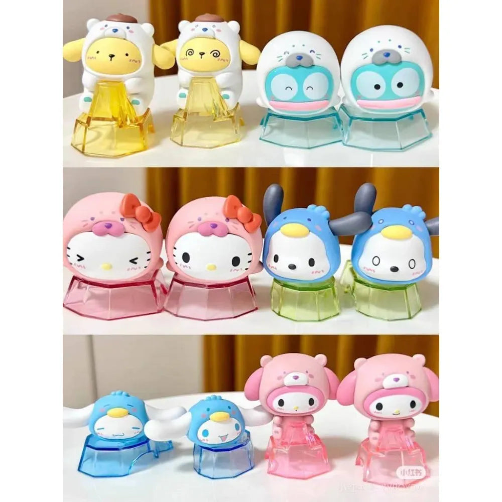 Sanrio Characters Glacier Series mini figurines display animal-hooded designs on translucent bases, showcasing Pompompurin, Hello Kitty, and more. Preorder from Strangecat Toys.