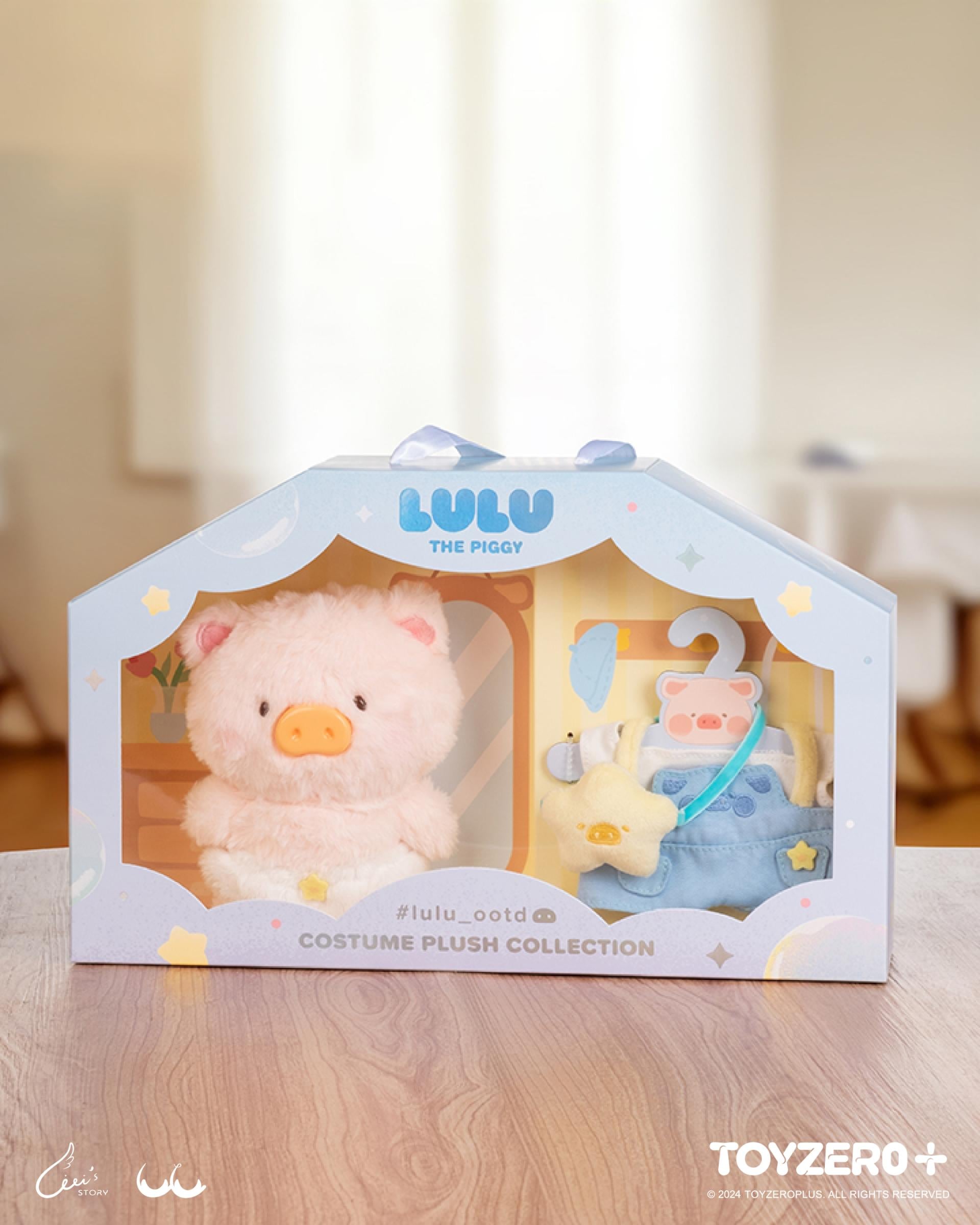LULU THE PIGGY OOTD - BASIC SET, featuring a stuffed pig toy in an outfit within a box, includes ID card and DIY clothing set.