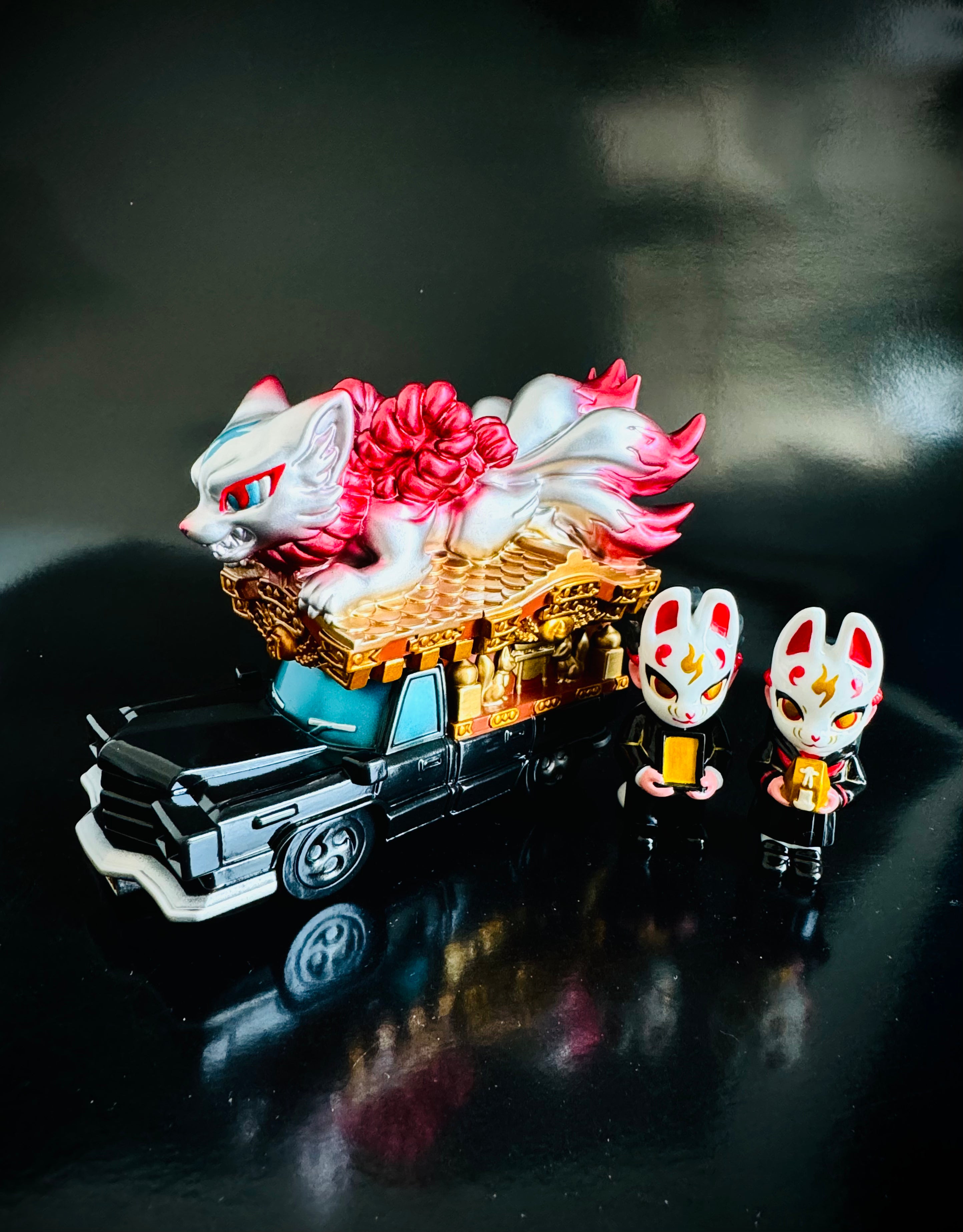 A blind box and art toy store. Alt text: The Genkosha Catafalque Set No 2: A luxury toy car with a fox couple, a coffin that opens, and small figurines.