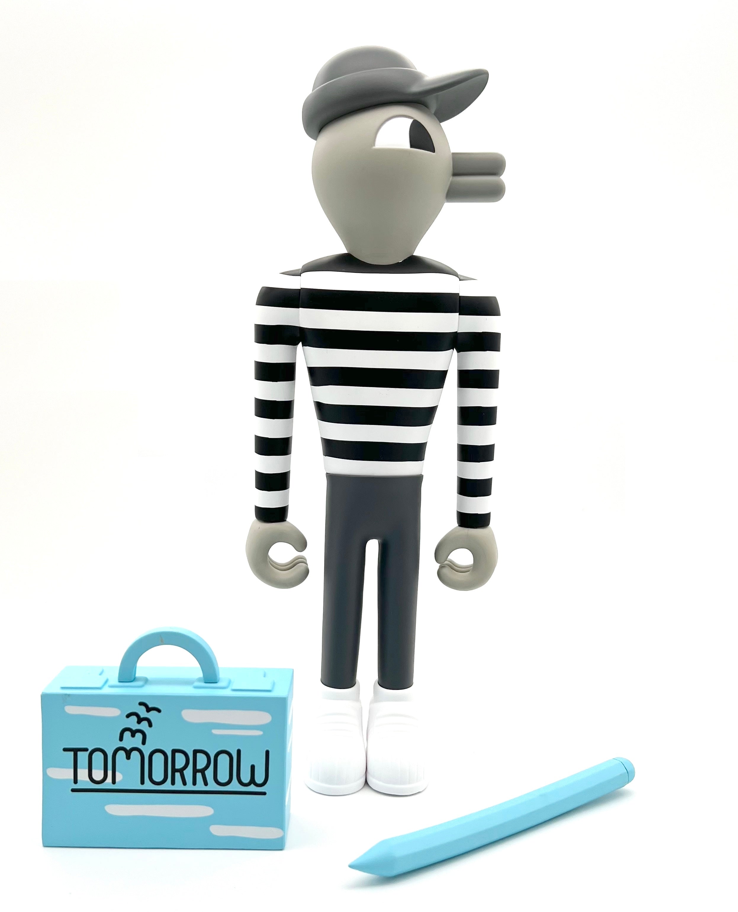 Tomorrow Bird by Jeremyville, a 12 vinyl toy figure with a hat and blue suitcase, featuring seven articulation points, produced by UVD Toys.