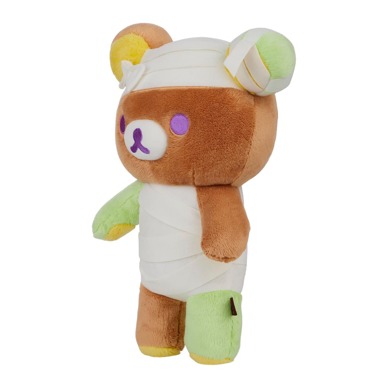 Rilakkuma San-X Original Mummy Costume Plush, a 14.5-inch teddy bear wrapped in stitched bandages, perfect for Halloween decor or gifting from Strangecat Toys.