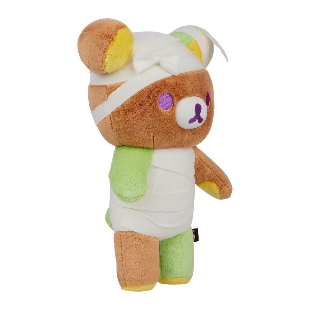 Rilakkuma San-X Original Mummy Costume Plush, 14.5 inches, featuring stitched bandages and purple button eyes, perfect for Halloween decor or gifting.