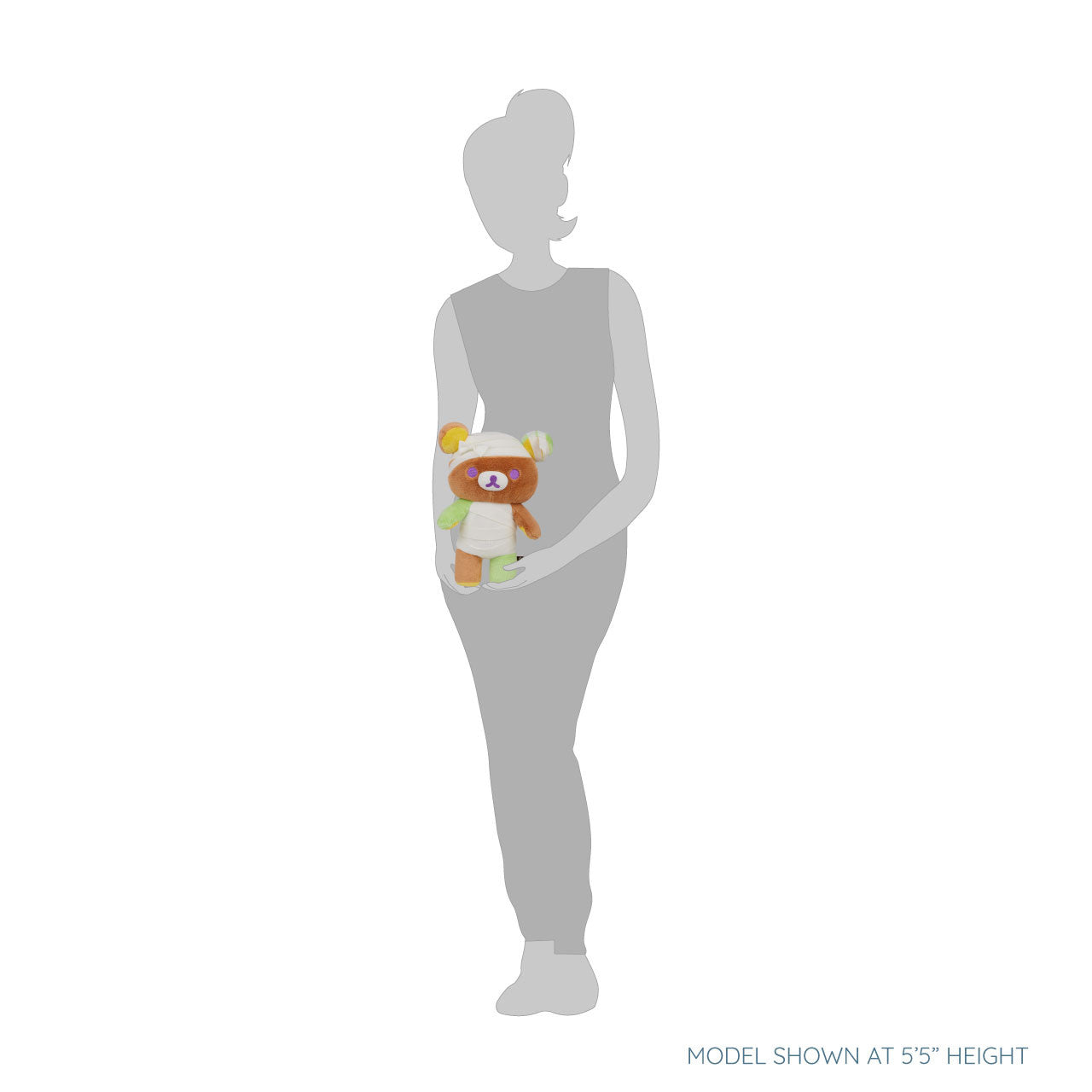 Rilakkuma San-X Original Mummy Costume Plush, 14.5 inches, shown with a 5′5″ figure, features stitched bandages for Halloween decor or gifting.