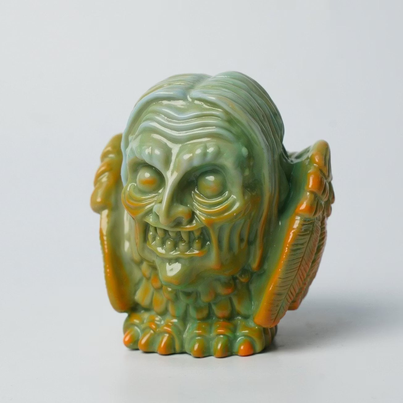 Retroband & Zectron's WHO GOES THERE? VERSUS figurine: a stylized, monster-like bust with winged arms, clawed feet, crafted in soft vinyl.