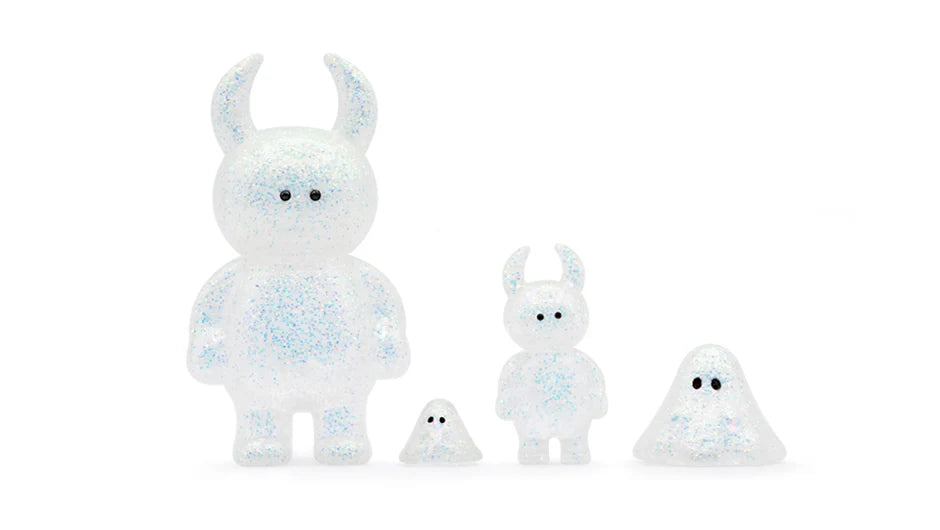 UAMOU WHITE OPAL figures: glitter-filled vinyl toys featuring a horned creature and ghost blobs, minimalist design, 7cm tall, collectible art toys.