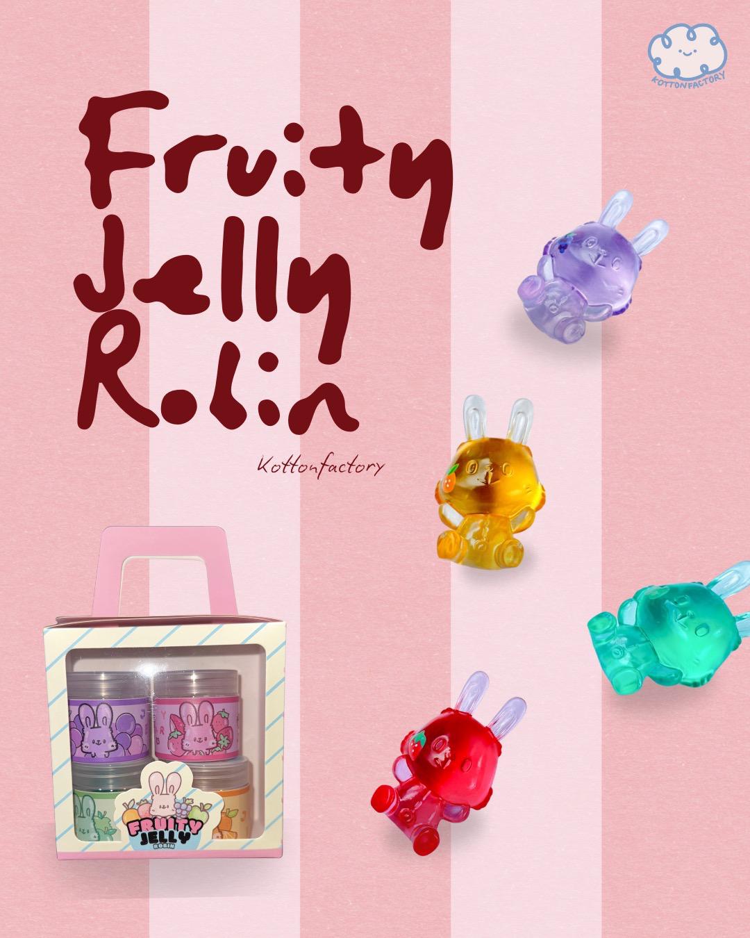 Fruity Jelly Rollin - Preorder: Four colorful jelly bunnies in jars, each themed by fruit, with a Kottonfactory smiling cloud logo, on a pink-striped backdrop.