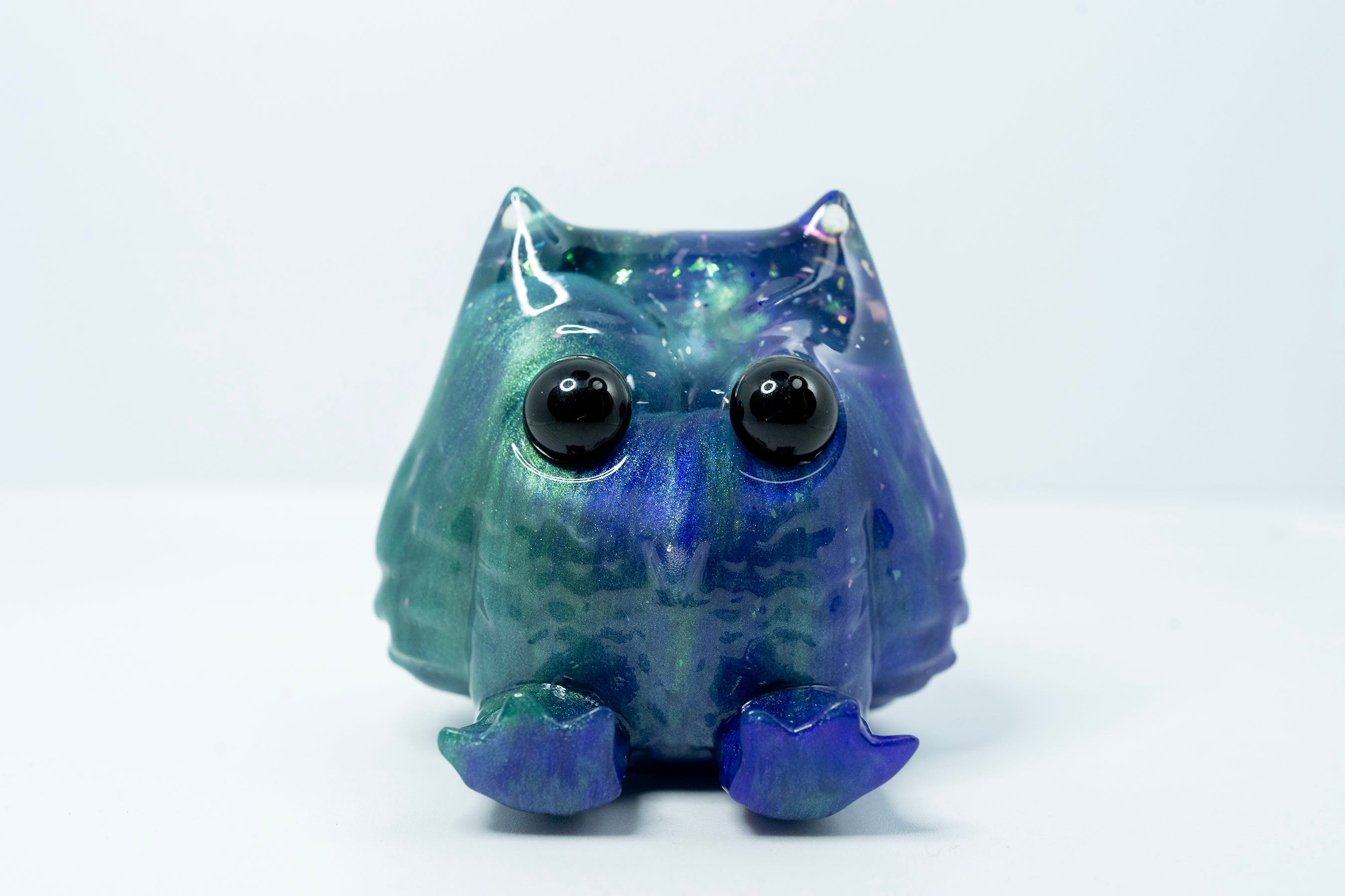 A blind box art toy: Little Shit Big Deal - Sitzend Wyze by House of Wyze. Resin owl figurine, 2.3cm, LE 5 Pieces, ships randomly. Gallery items ship 28 days post-show opening.