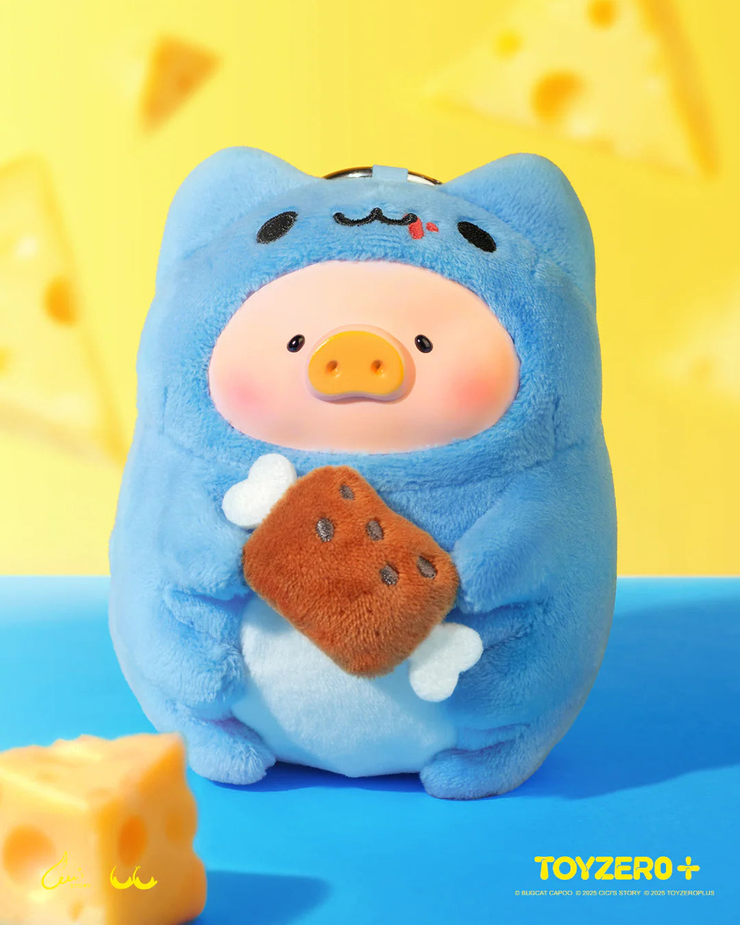 LuLu the Piggy x Capoo plush keychain, featuring LuLu in a blue cat costume holding a meat prop, by TOYZERO+.