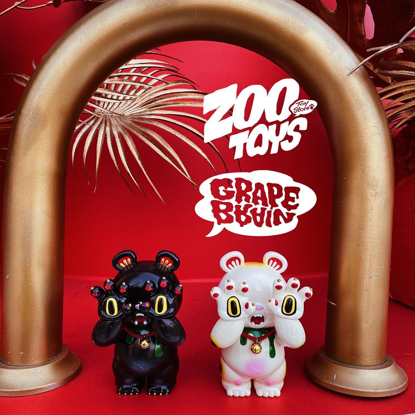 Two cartoon bear figurines under a gold arch, a soft vinyl statue with hands, and a logo close-up.