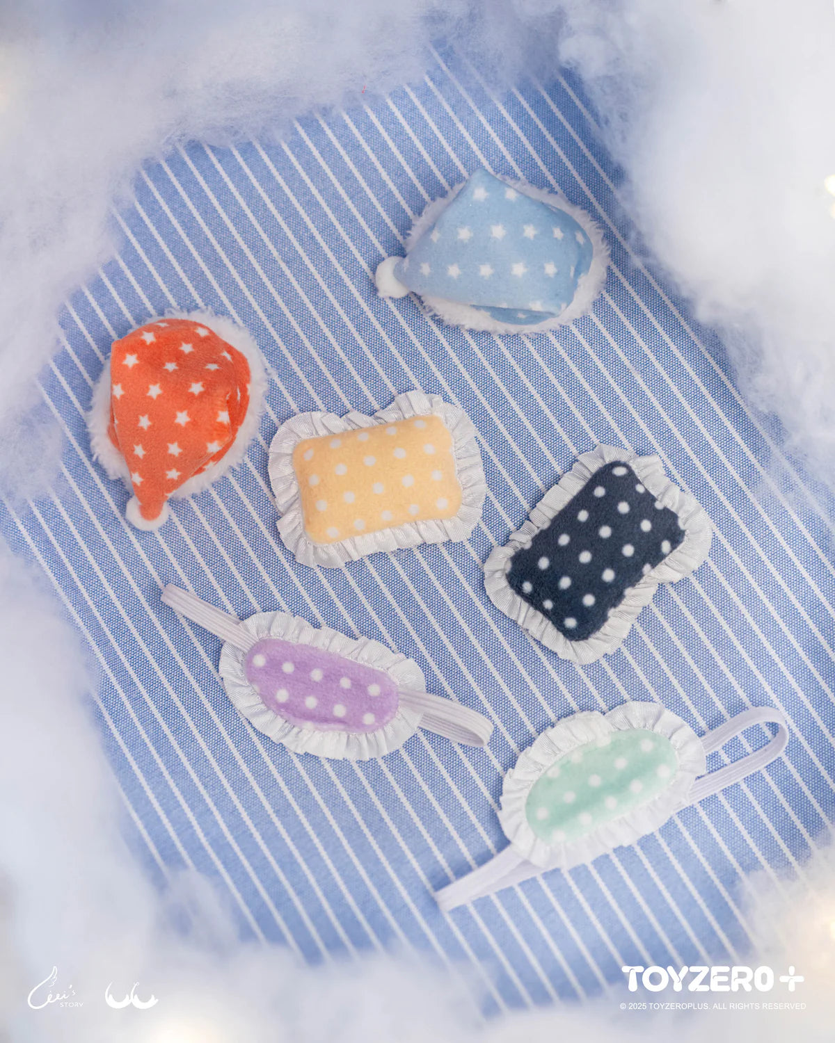 LuLu the Piggy - Dreaming Wonderland Series plush keychain accessories, featuring miniature nightcaps and pillows, displayed on a cloud-themed setting.