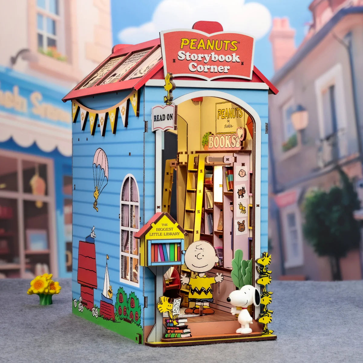 Peanuts Storybook Corner Booknook: A miniature library diorama featuring Charlie Brown and Snoopy, with detailed bookshelves and figures. Includes LED light, requiring assembly.