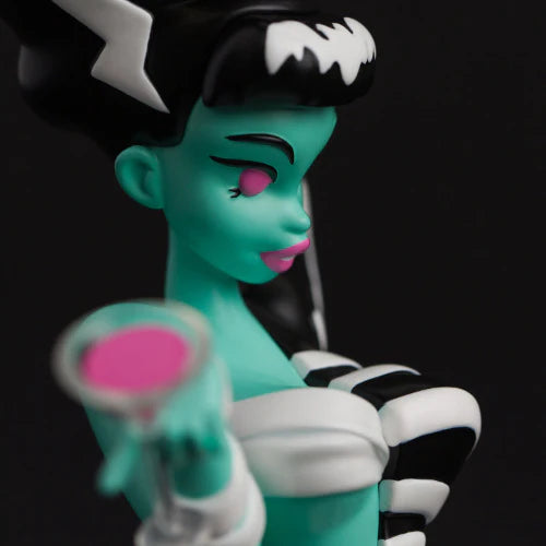 Bride Bones LIMITED EDITION RESIN FIGURE: Stylized female monster art toy with teal-green skin, black hair, holding pink martini, embodying classic monsters and punk rock fusion.