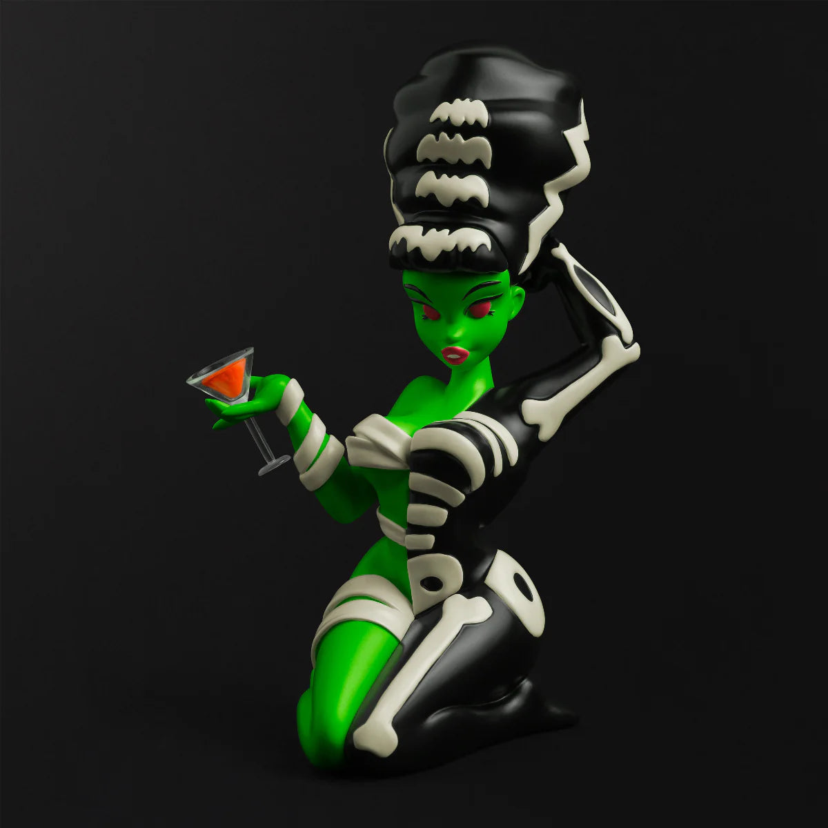 Bride Bones LIMITED EDITION RESIN FIGURE: A 7 green-skinned, beehive-haired figurine in bone-patterned attire, holding a cocktail, embodying punk rock and horror.