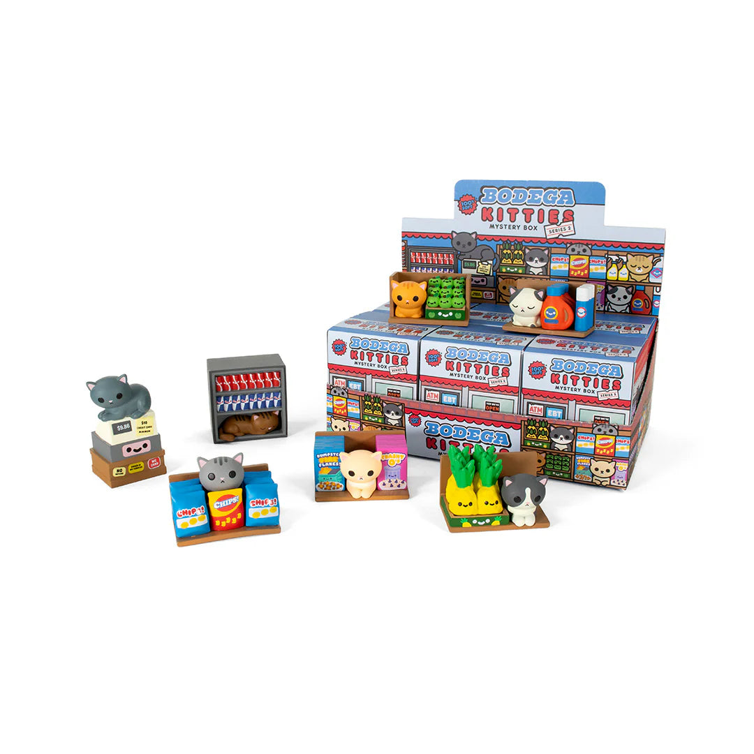 Bodega Kitties Mystery Series 2 Boxes by 100% Soft, featuring adorable cat figurines on mini bodega shelves. Surprise blind box includes single or case of six.