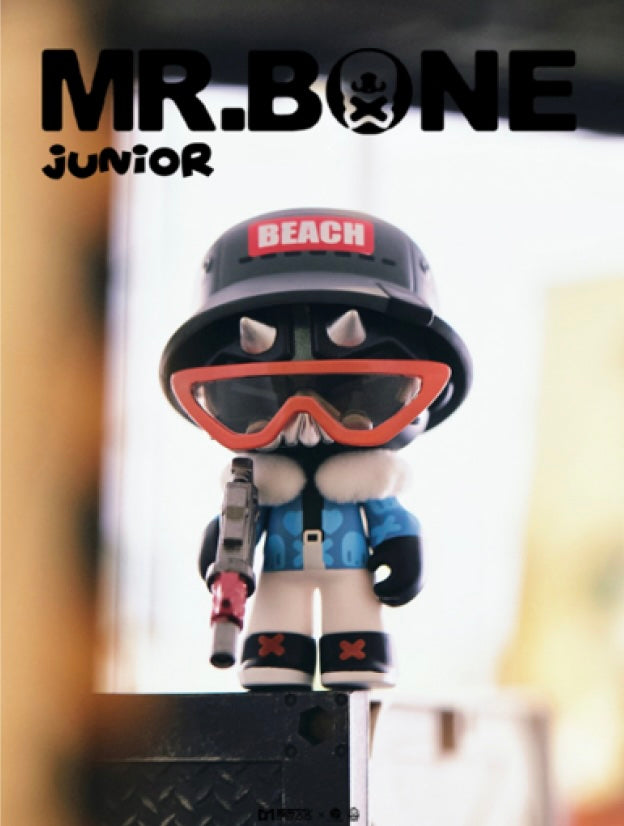Mr Bone 75% Blue Solomen - Preorder: A limited edition designer toy, an 8cm skeleton figure with accessories, featuring a helmet, jacket, and toy gun.