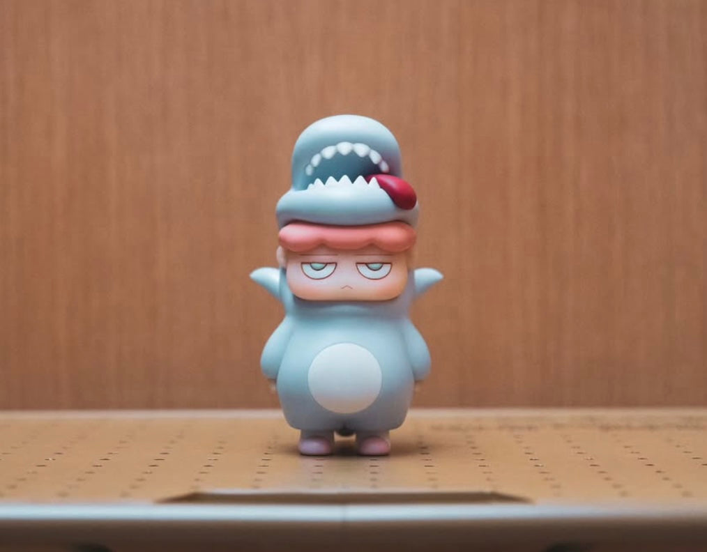 Poh Dino Blue Thunder by Vin, a 16.5cm vinyl art toy, available for preorder, ships May 2025 from Strangecat Toys.