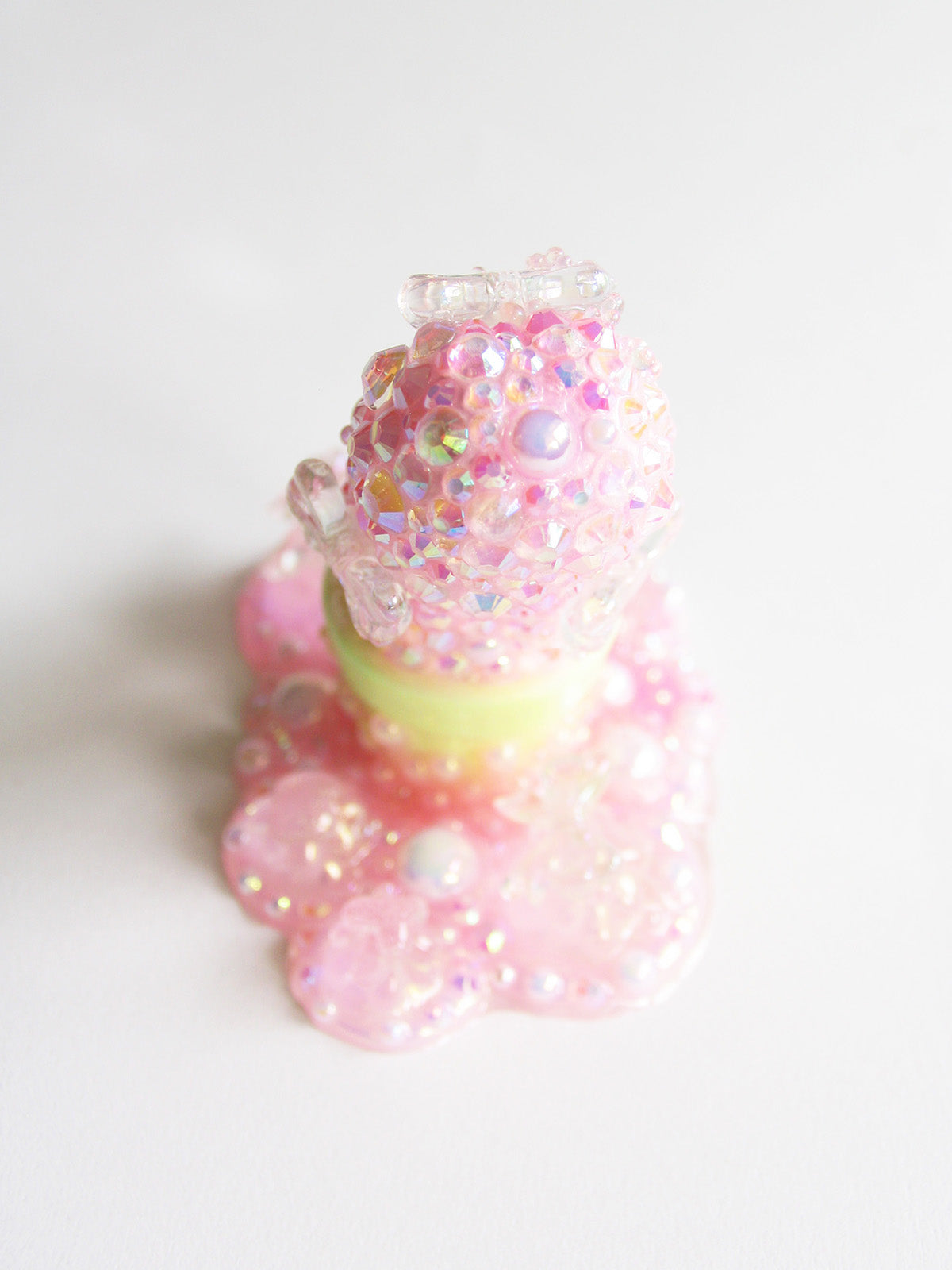 Pink slime with glitter and bubbles, close-up of a confectionery item, custom design by Simon Says Macy & Friends.