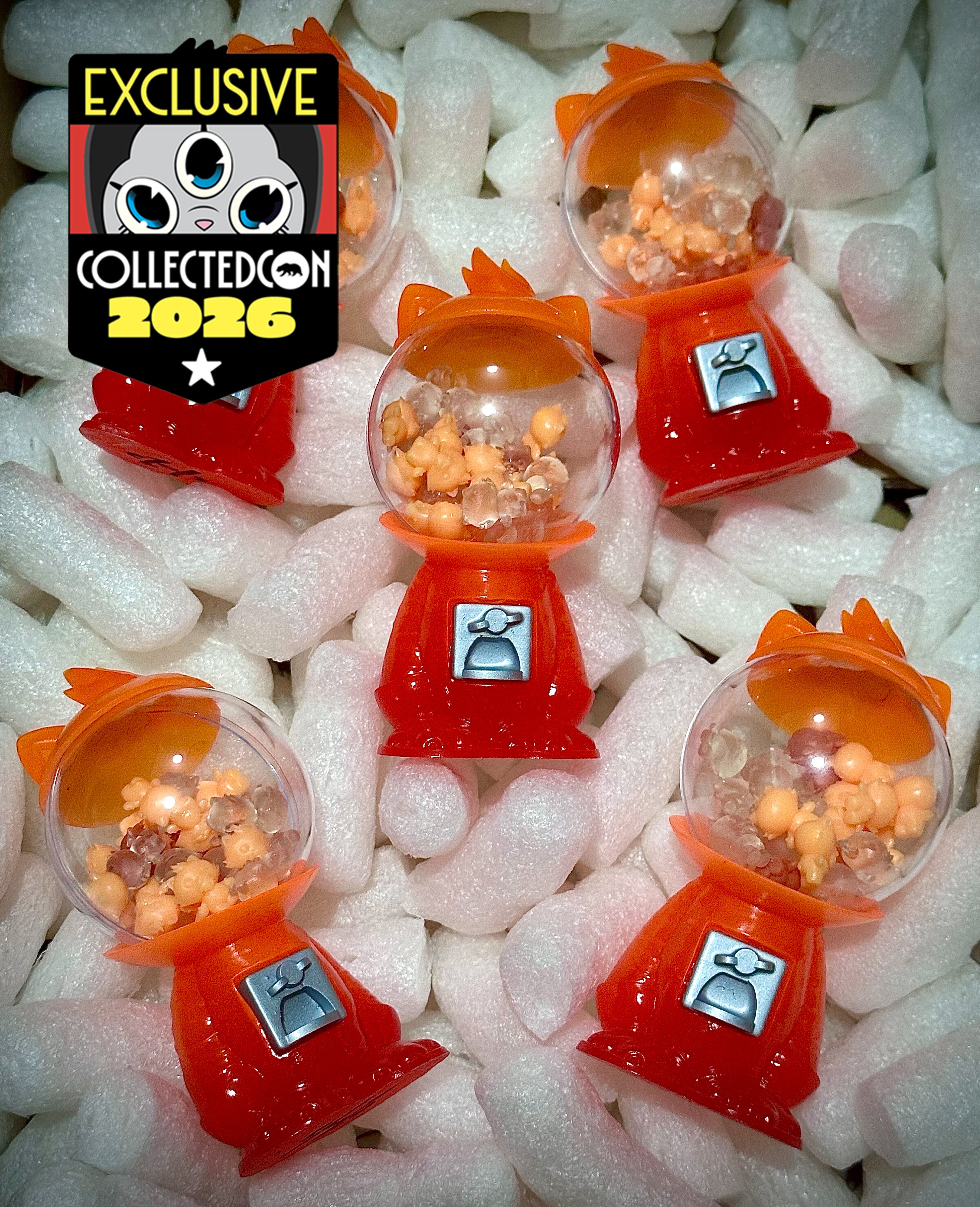 Tequila Sunrise Strangecat Space Candy by CZEE13: five resin capsule toys with micro-figurines, nestled in foam, limited to 7 pieces, exclusive to CollectedCon 2026.
