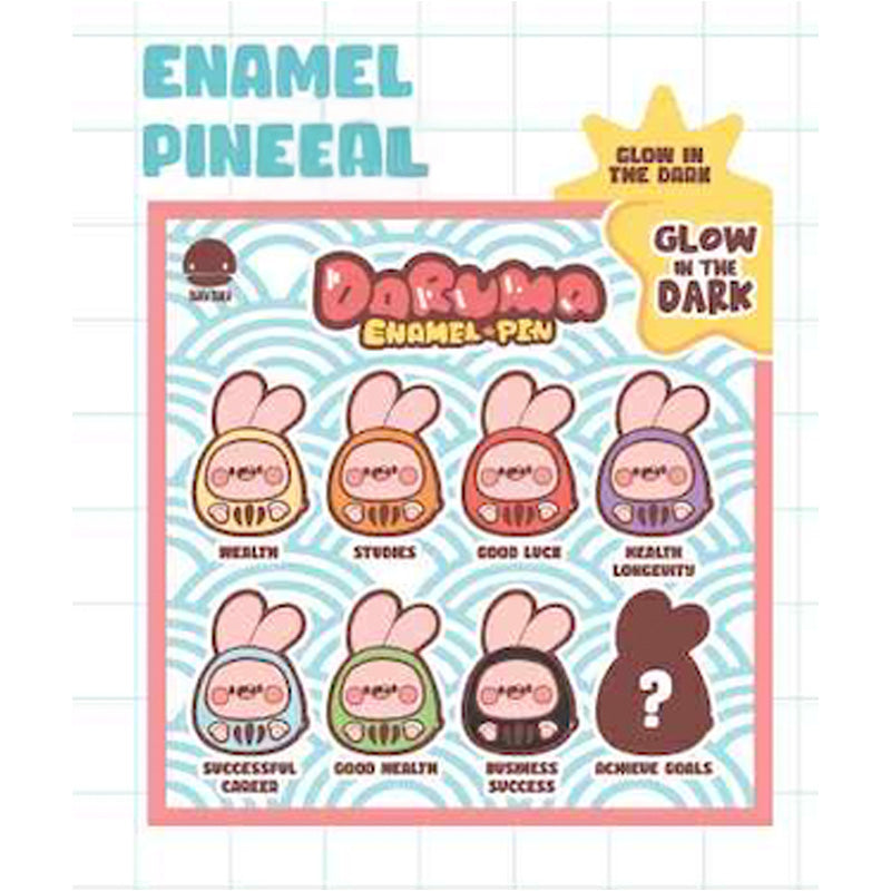Ngaew Daruma Mystery Pin sheet featuring seven bunny-eared enamel pins with wishes like Health and Good Luck, plus a mystery silhouette pin. Pins glow in the dark.