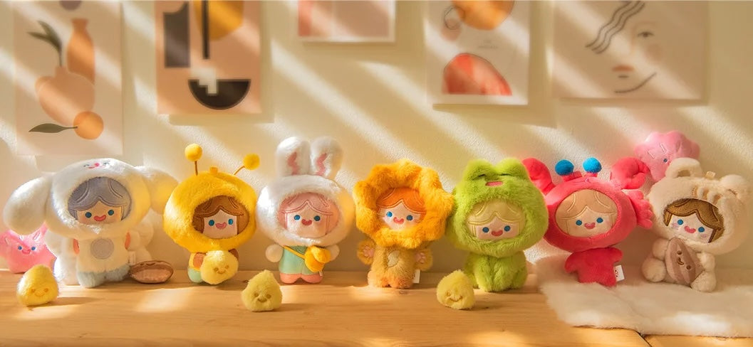 RiCO Happy Fluffy Series Plush Blind Box featuring assorted stuffed animal figures displayed on a table, part of a collectible art toy collection.