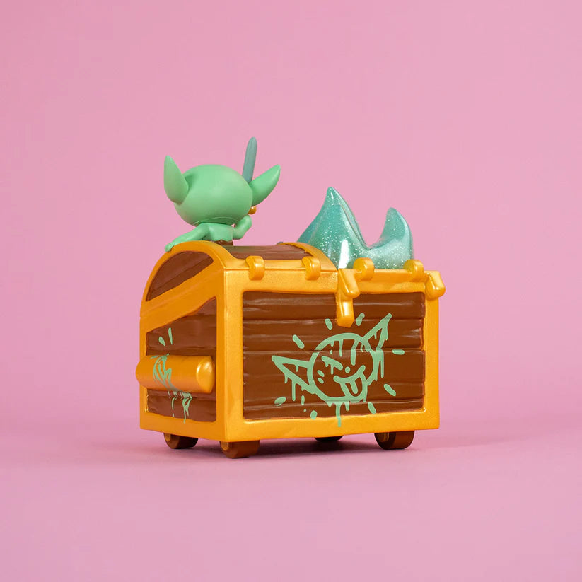 Wizard of Barge Dumpster Fire Vinyl Figure atop a treasure chest with slime, featuring detachable sword. Preorder for November 2025.