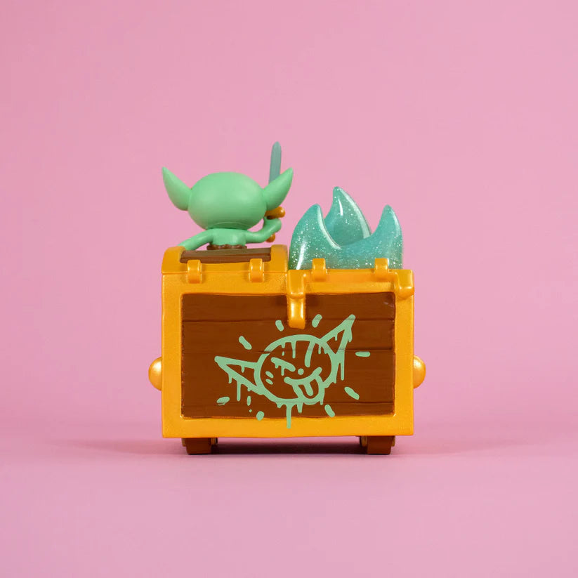 Wizard of Barge Dumpster Fire Vinyl Figure - Preorder, featuring a goblin with sword on treasure chest, includes teal flame effect.