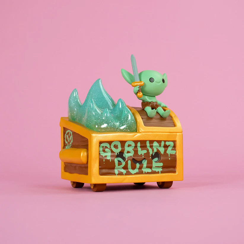 Wizard of Barge Dumpster Fire Vinyl Figure - Preorder: A goblin with a sword on a treasure cart, featuring graffiti GOBLINZ RULE.