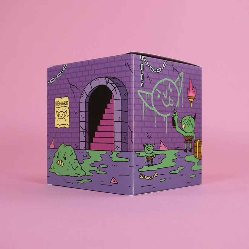Wizard of Barge Dumpster Fire Vinyl Figure preorder box featuring whimsical dungeon scene with goblins, slime, and graffiti art. Perfect for Strangecat Toys’ unique collection.
