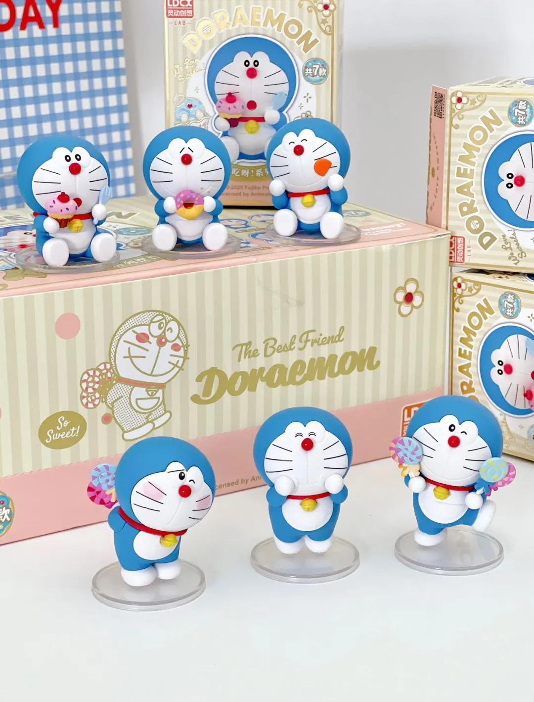 Doraemon Vol.1-Delicious Food Figurine Blind Box - Preorder, featuring a toy cat with a donut, part of a 6-design series from Strangecat Toys.
