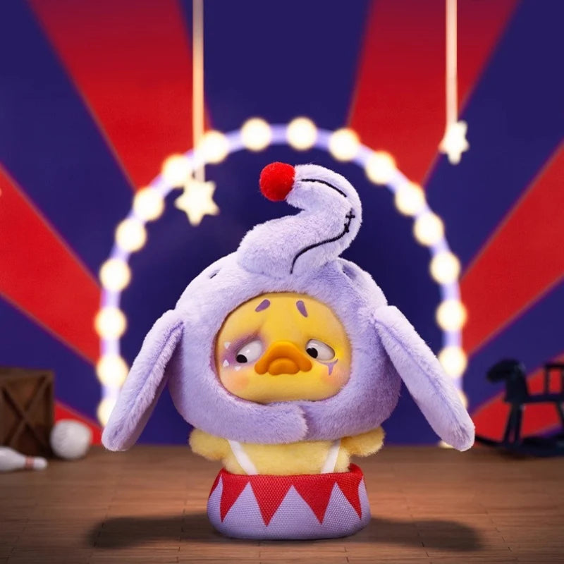 Upset Duck - Pocket Crazy Circus Duck perched in a circus drum, wearing a quirky purple elephant hat with a pom-pom, amid whimsical circus decor.