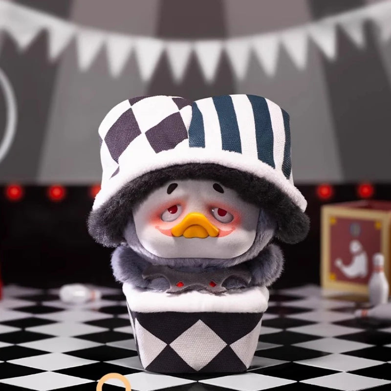 Upset Duck - Pocket Crazy Circus Duck plush toy in a black-and-white patterned box, part of a collectible series from Strangecat Toys.