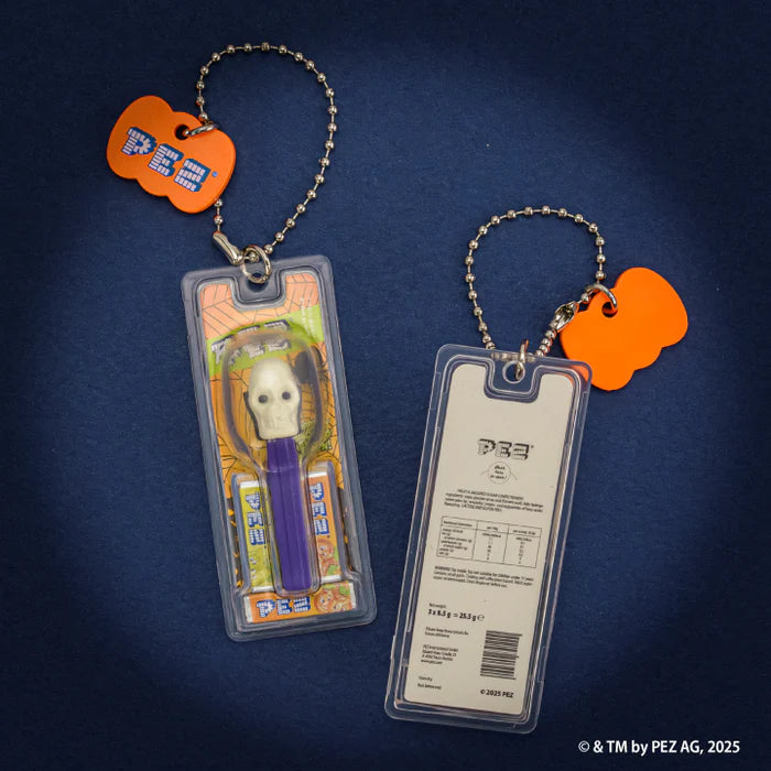 PEZ Ball Chain Mascot Halloween Ver. Gacha Series features skull-themed candy-dispenser keychains with pumpkin tags, packaged in blister cards, ideal for Halloween.