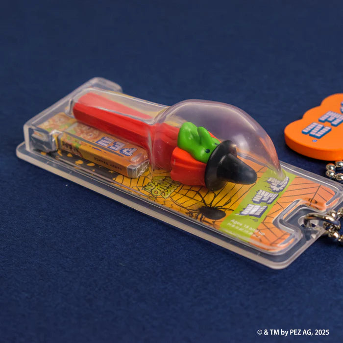 PEZ Ball Chain Mascot Halloween Ver. Gacha Series: A witch-themed dispenser with candy, ball-chain, and spider-themed packaging. Ideal for backpacks or key rings.
