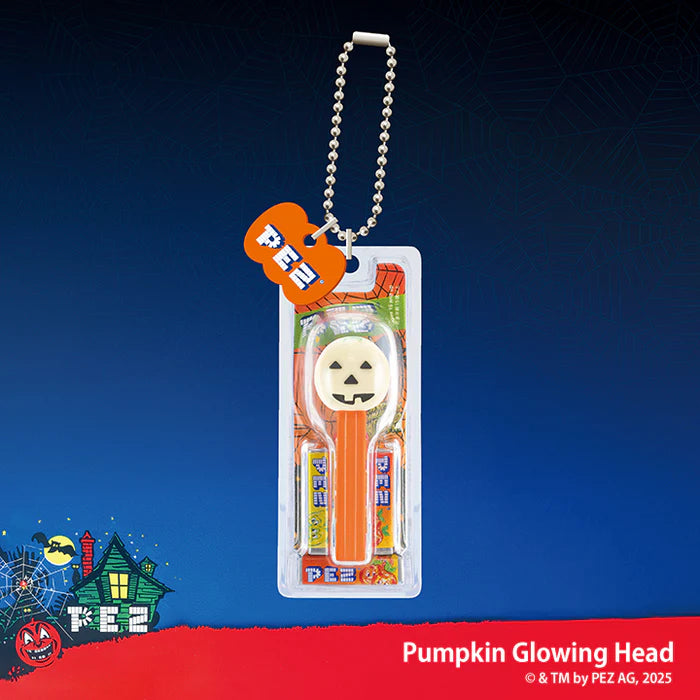 PEZ Ball Chain Mascot Halloween Ver. Gacha Series with a glowing pumpkin head dispenser, candy refills, and keychain tag in retail packaging.