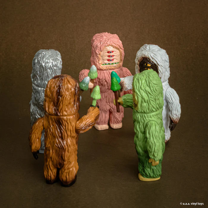 Big Wood Figure Collection Gacha Series: Five vinyl monster figures encircle a pink central figure, each holding tiny mushrooms, showcasing Strangecat Toys' whimsical art toy offerings.
