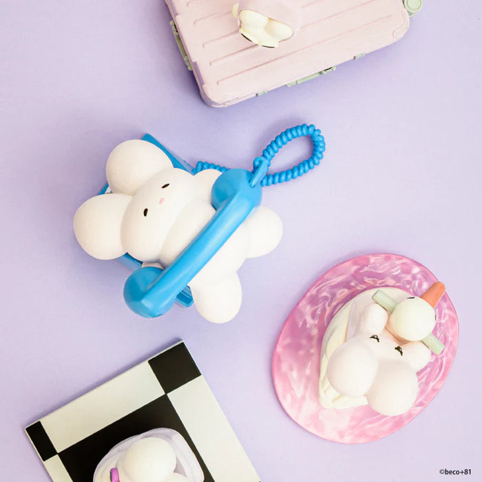 Three cloud-shaped animal figurines from beco+81 Art Emotional Collection Gacha Series arranged playfully with pastel props, embodying Strangecat Toys' whimsical art toy aesthetic.