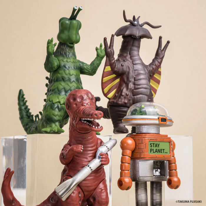 Takuma Fujisaki's 3D Monster Encyclopedia figures, featuring a dinosaur-alien hybrid, retro robot, lizard monster, and winged creature, embody the Tokyo Monster Universe Vol. 2 Gacha.