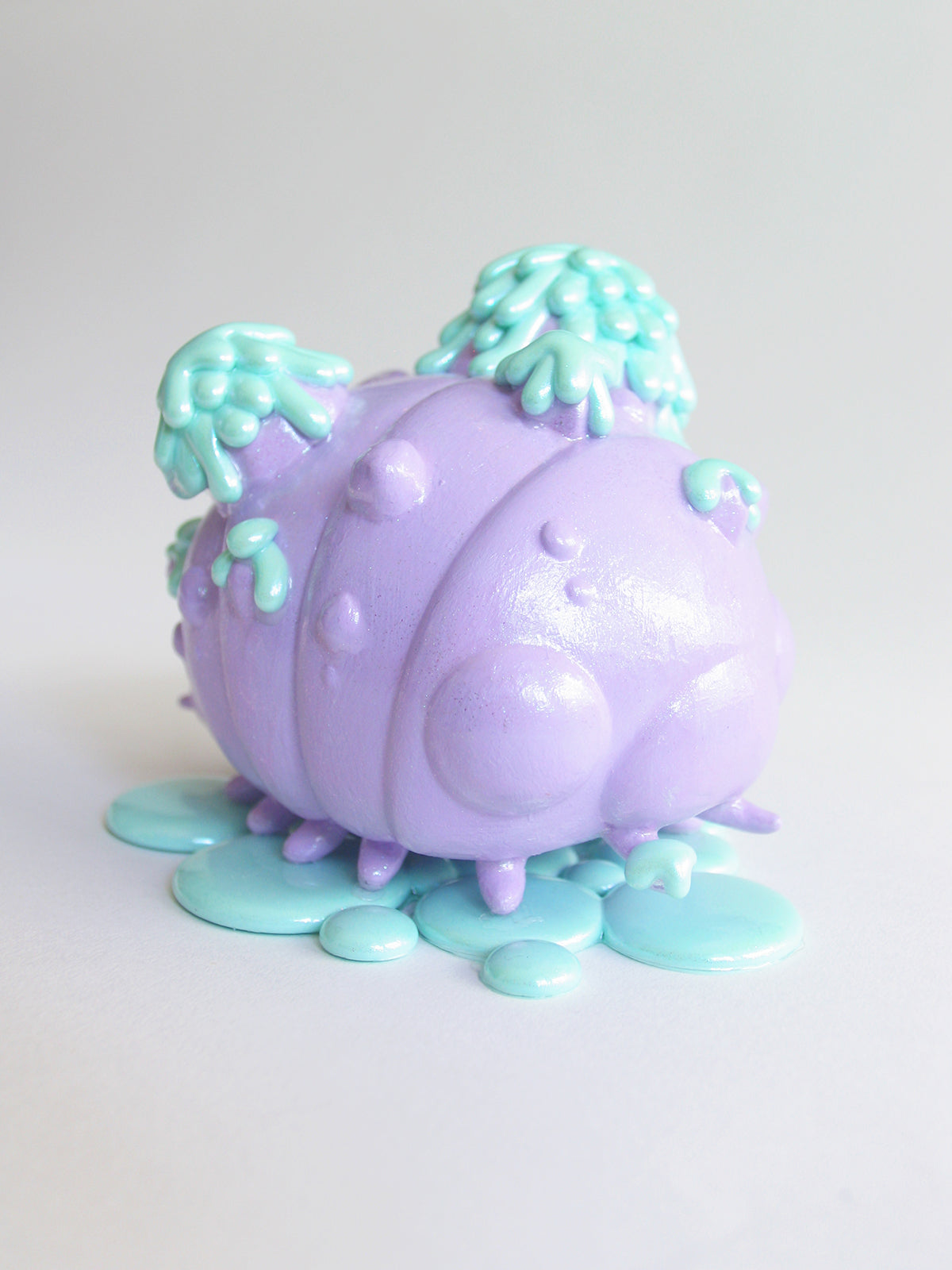Animal figure toy, Melty World - Melty Gempod by Brigitte Coovert, featuring slime and liquid elements.