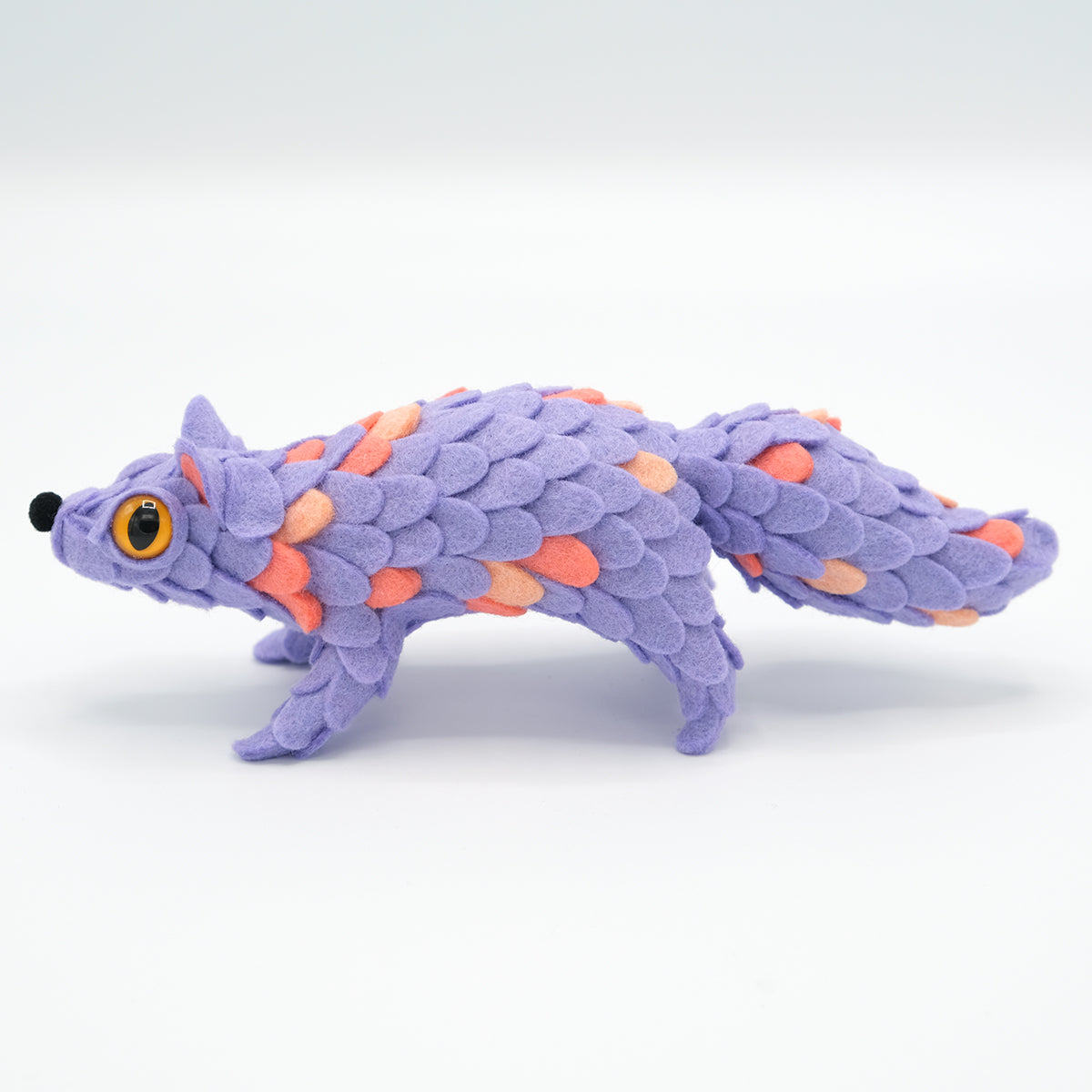 Adorable Oracle by Horrible Adorables x Faunwood: A handmade plush creature with felt scales, yellow eyes, and a bushy tail, embodying unique artistry.