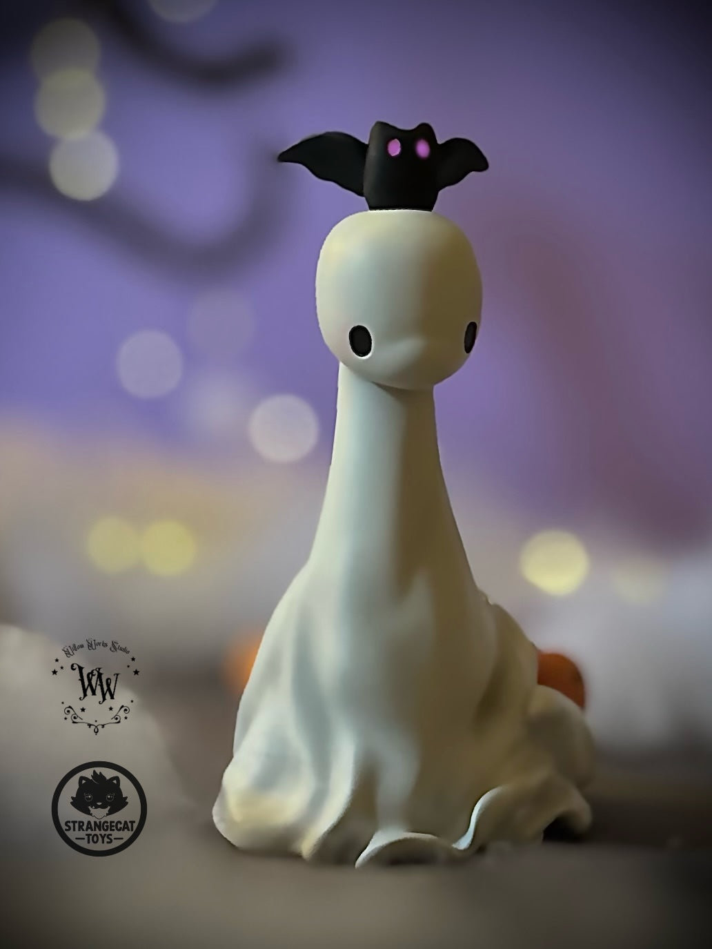Ghost Dino vinyl figure with a bat on its head, by Willow Works. Limited edition collectible, 4 high-impact resin. Preorder for October 2025 shipment.